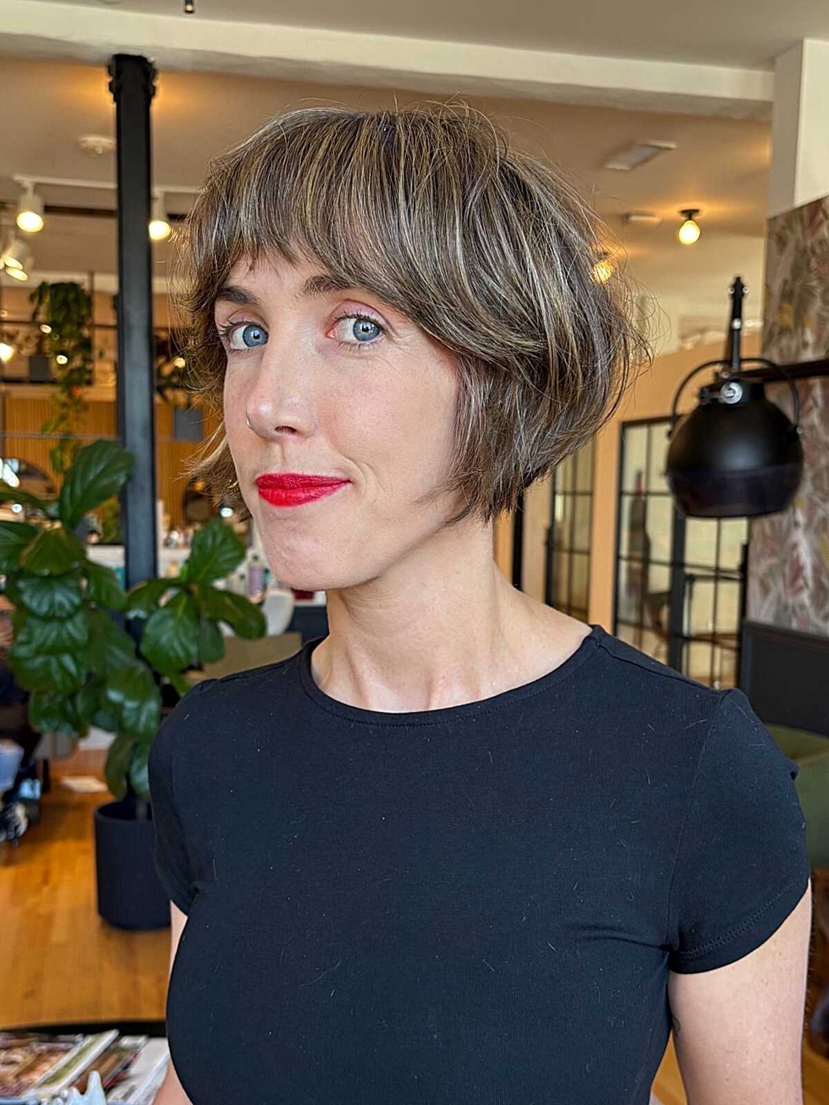 Soft fringe bixie with warm ash tones and chin-length sides