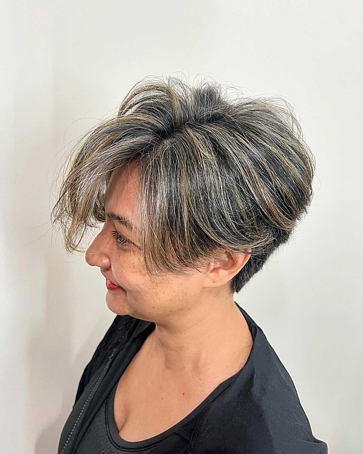 Tousled salt and pepper bixie with dramatic crown lift