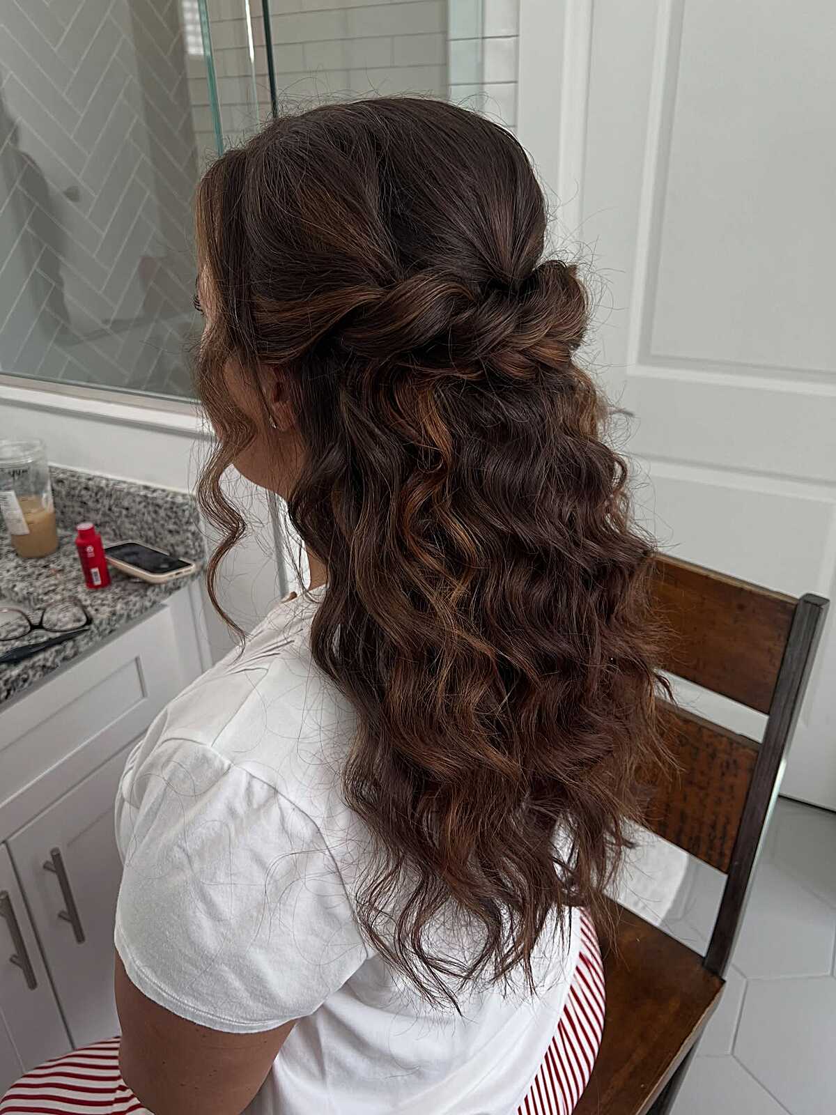 Tousled half up half down with dark brunette waves