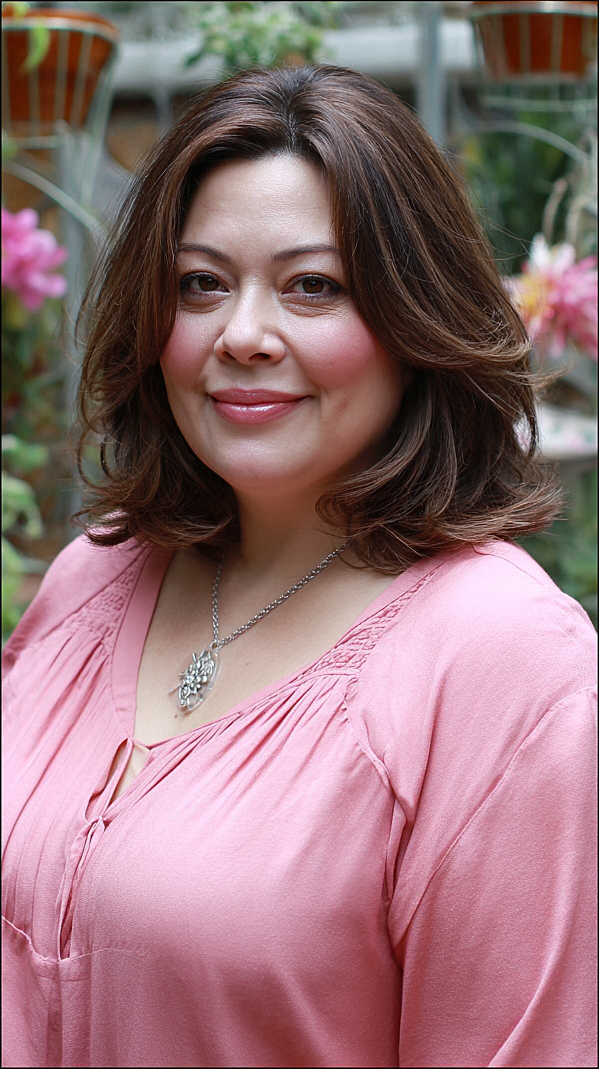 Classic chocolate brown long bob with layered blowout body