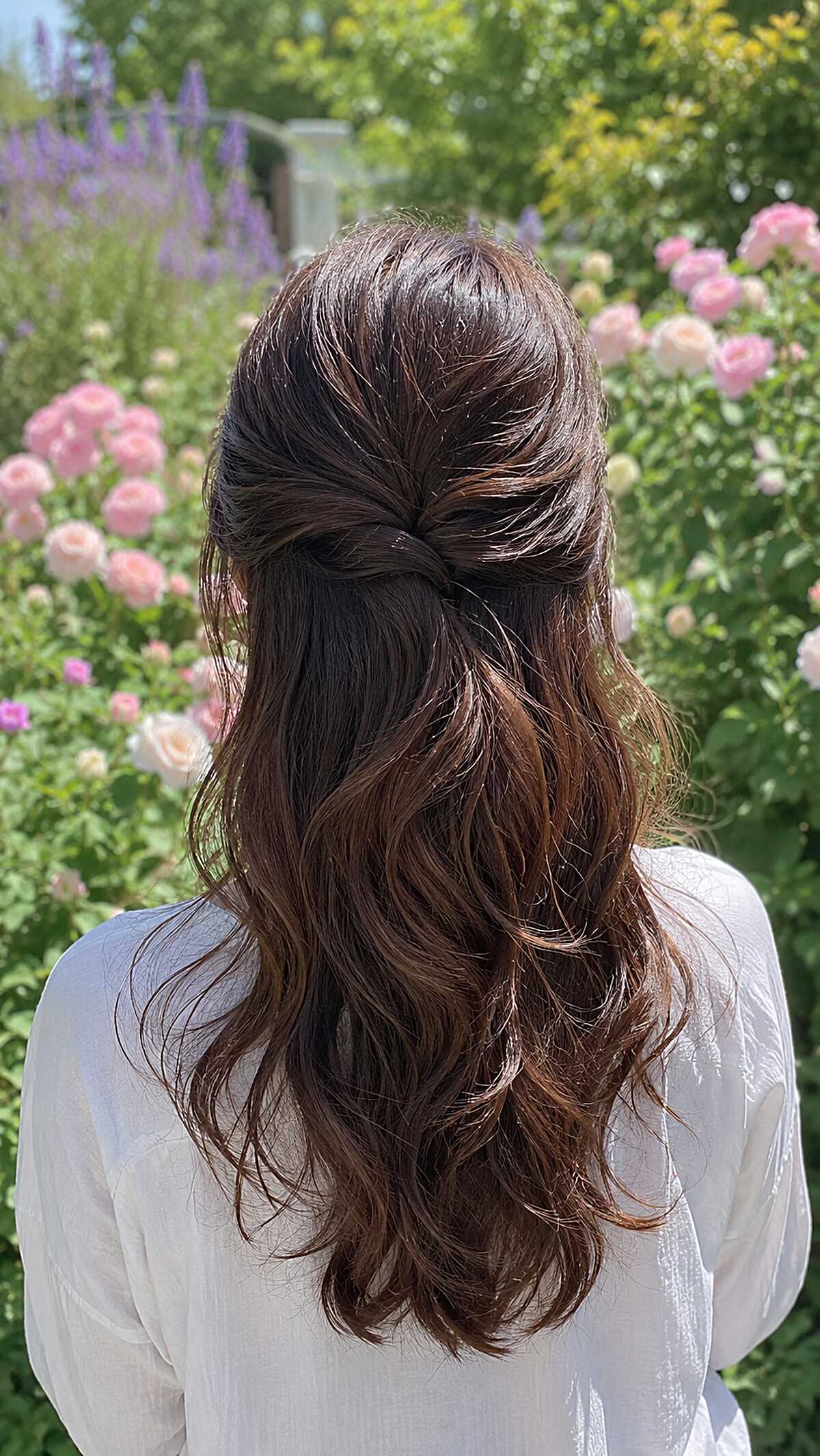 Dark brunette half up half down with soft natural waves