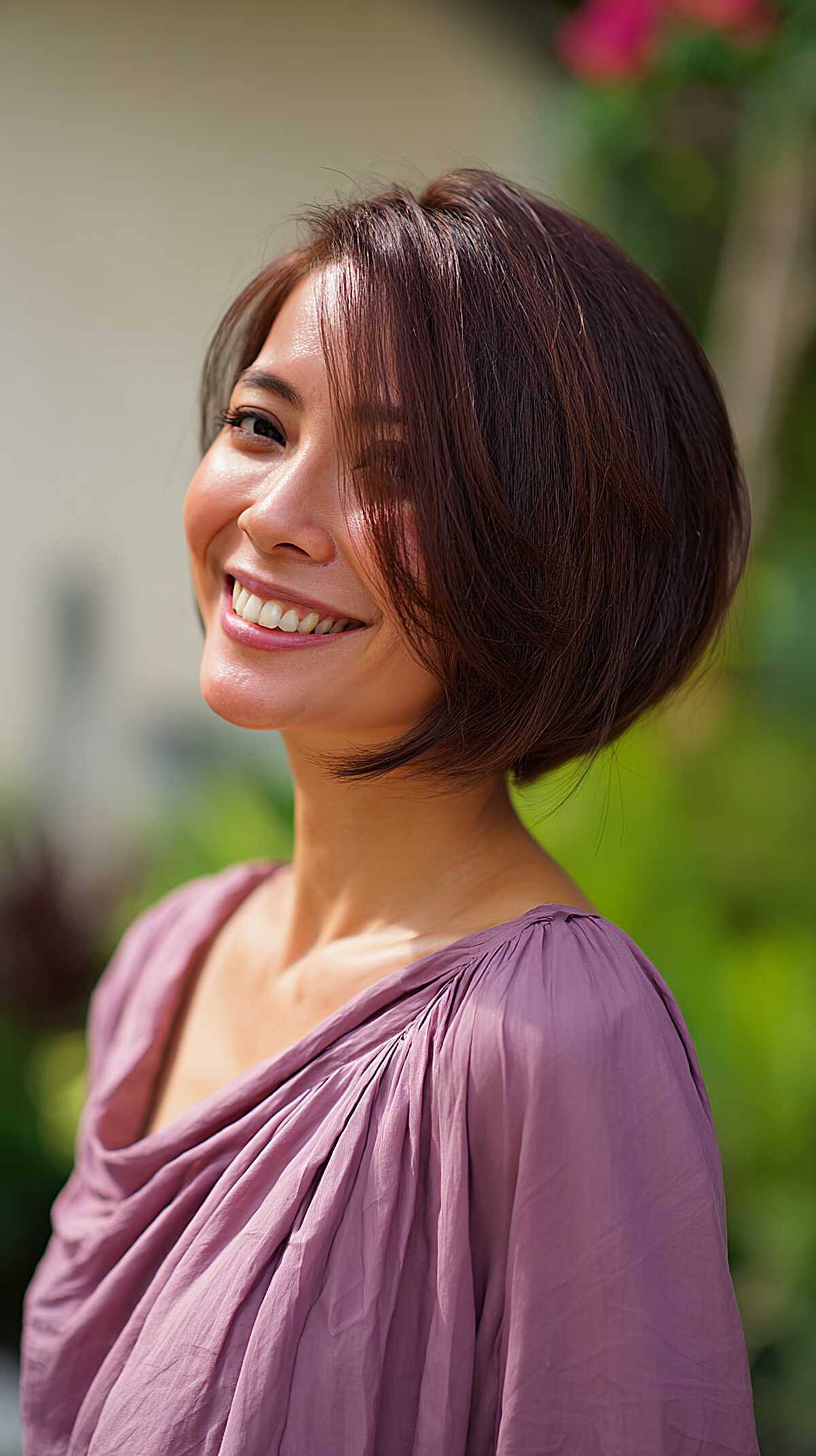 Polished plum-brown graduated asymmetrical bob