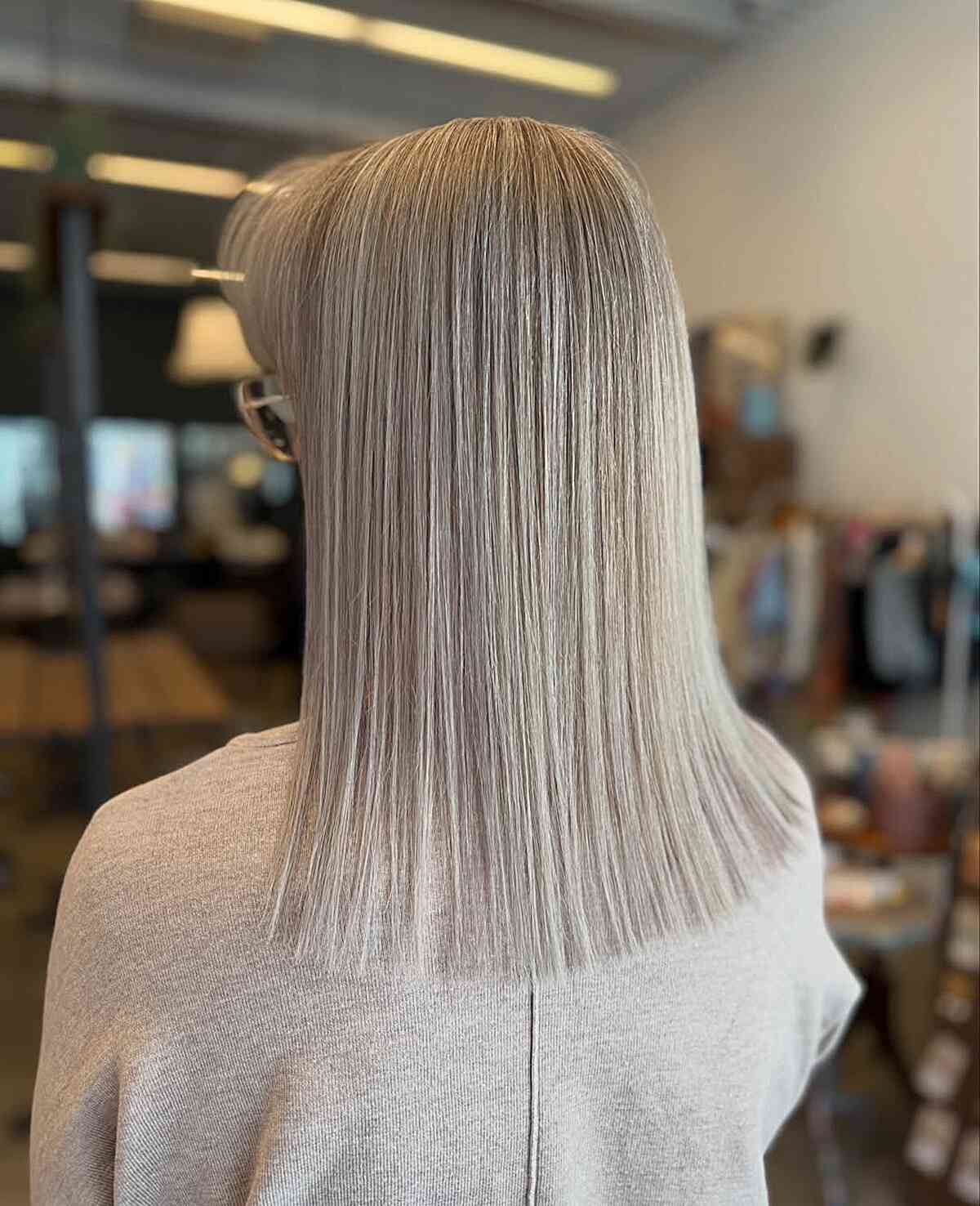 Sleek Long Grey Blunt Cut