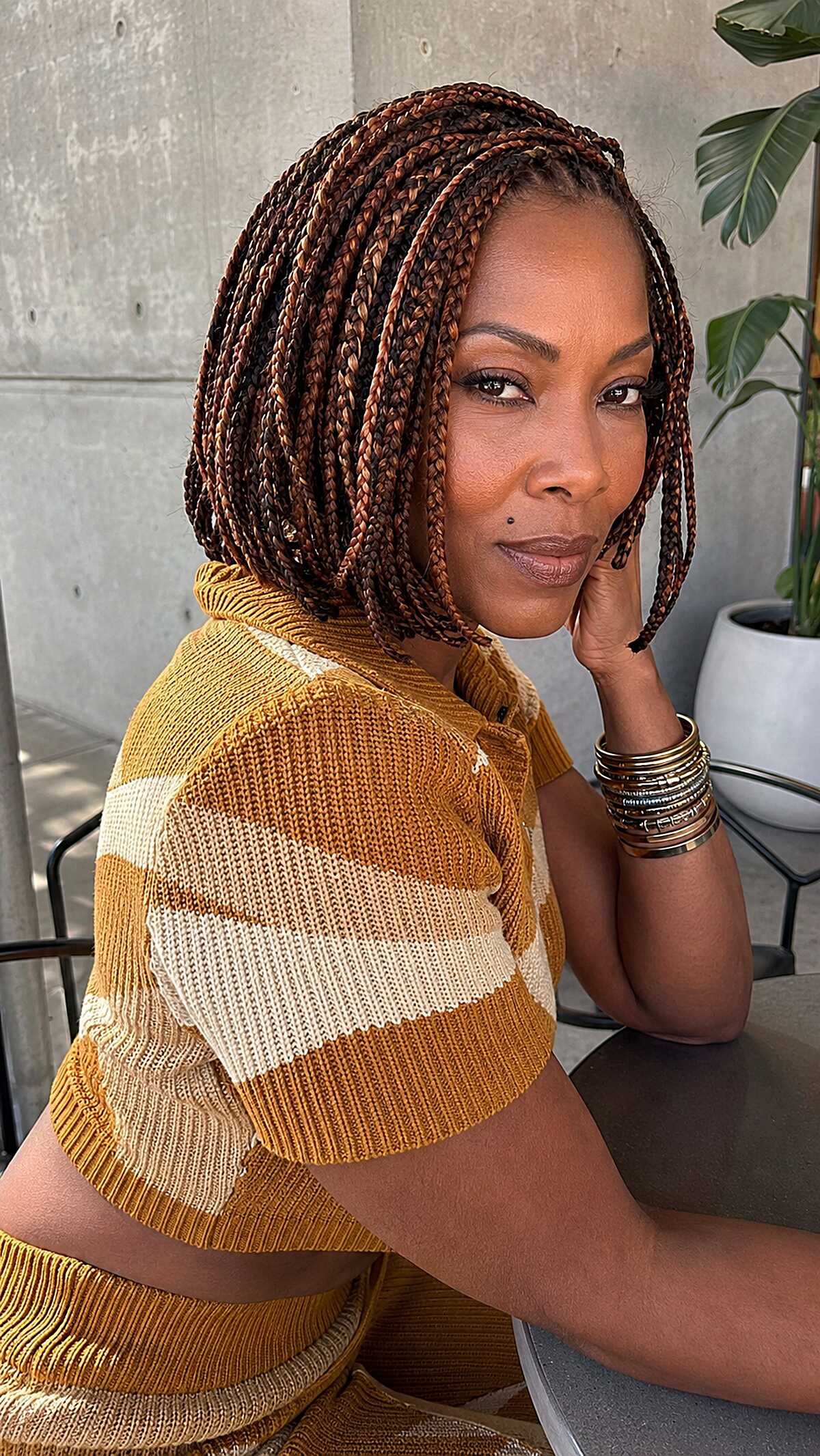 Auburn knotless braided bob with a rounded shape