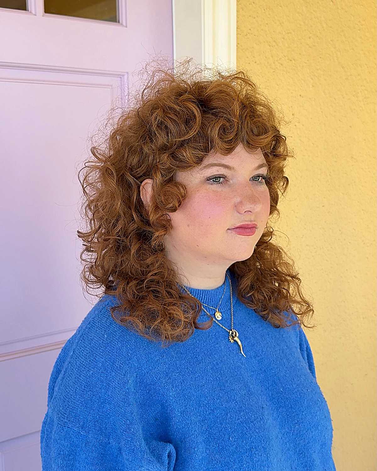 Voluminous copper curly shag with defined ringlets