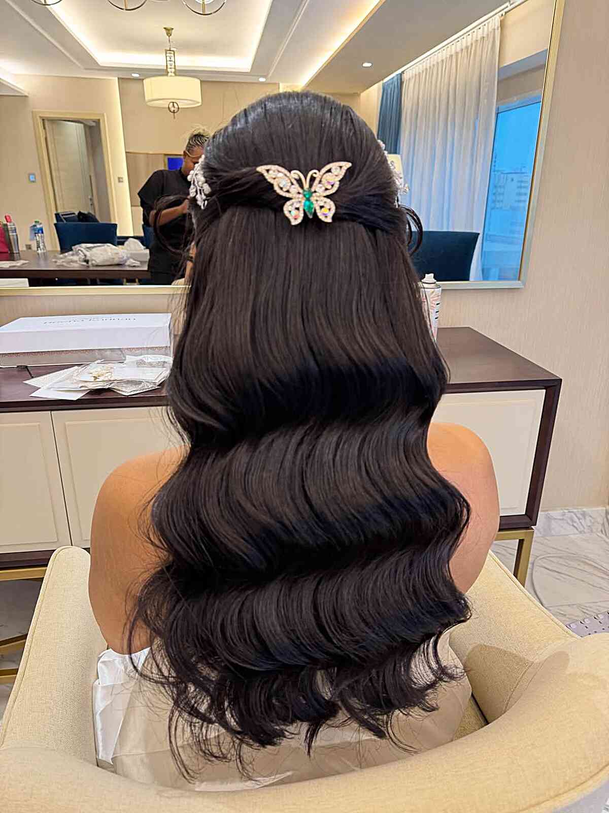 Glamorous Long Wavy Hairstyle with Butterfly Clip