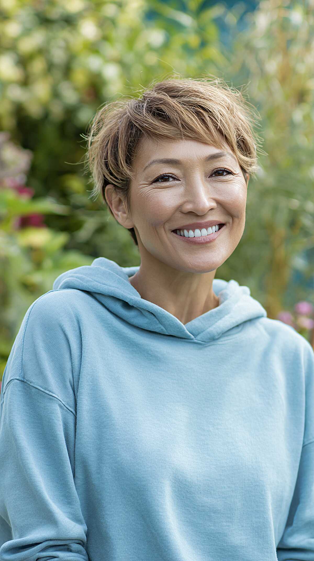 Short caramel pixie with textured fringe and highlights