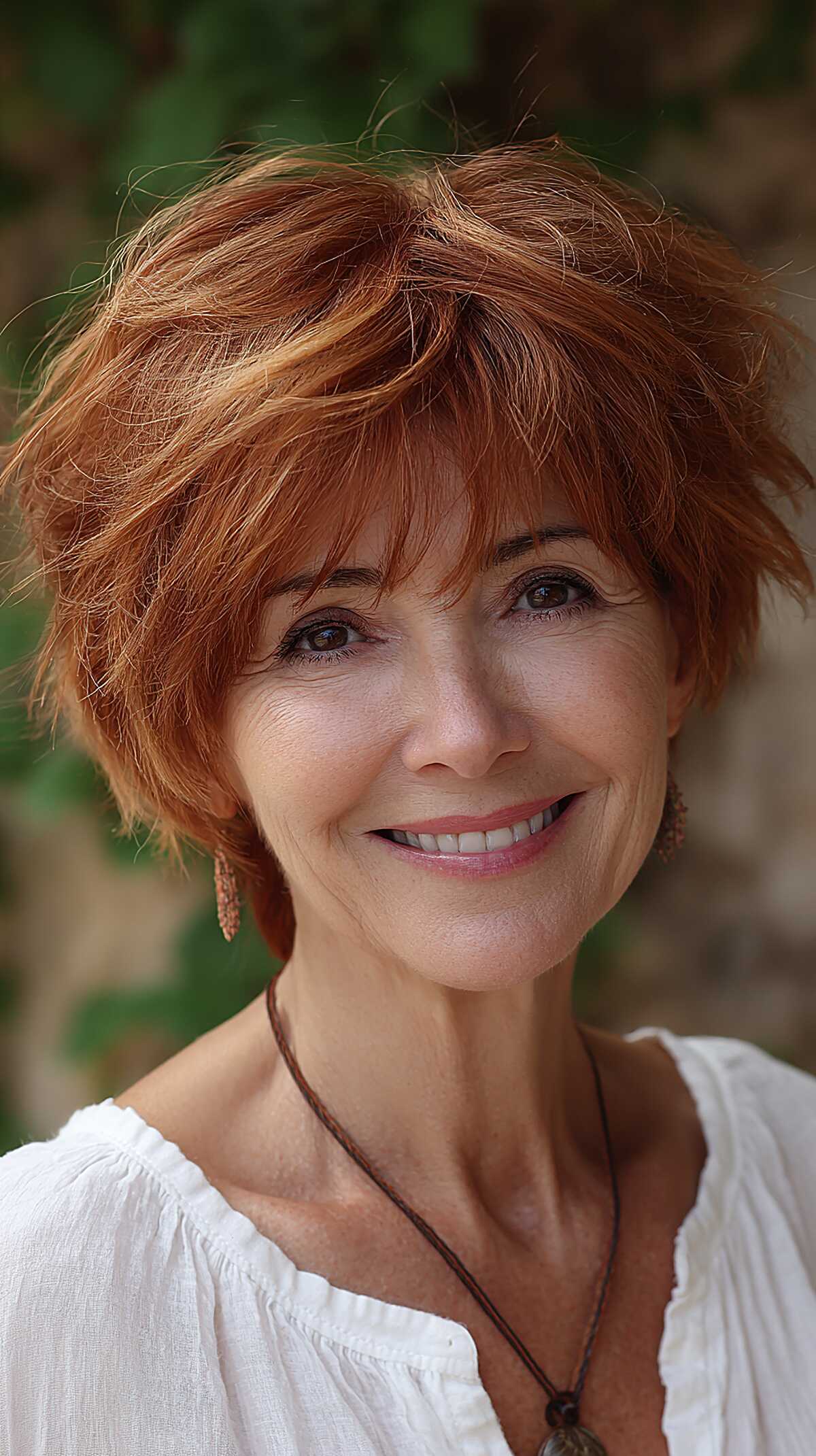 Vivid copper red shag with razored crown for over 60
