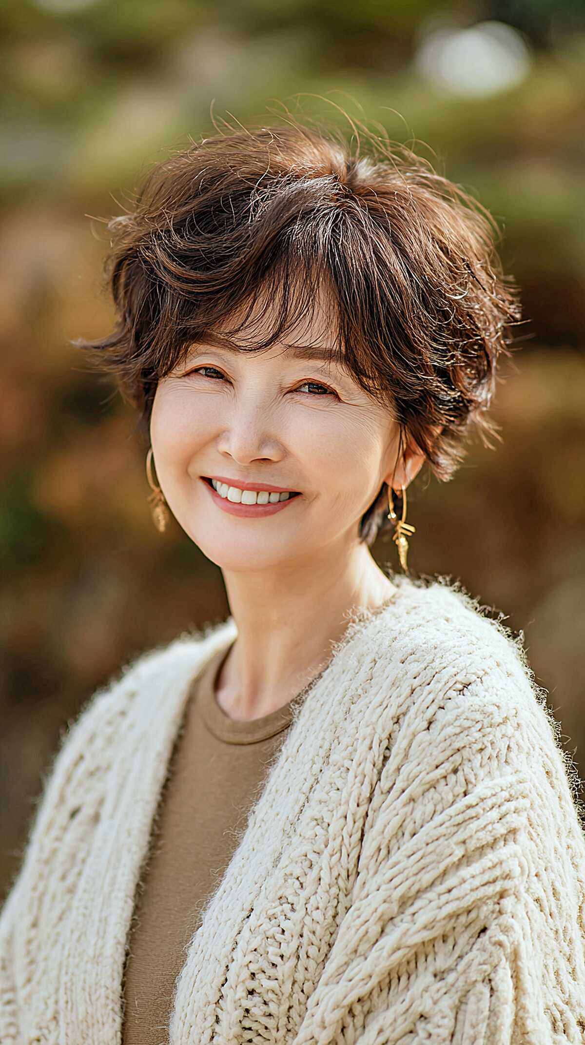 Wispy brunette pixie shag with flipped ends over 60