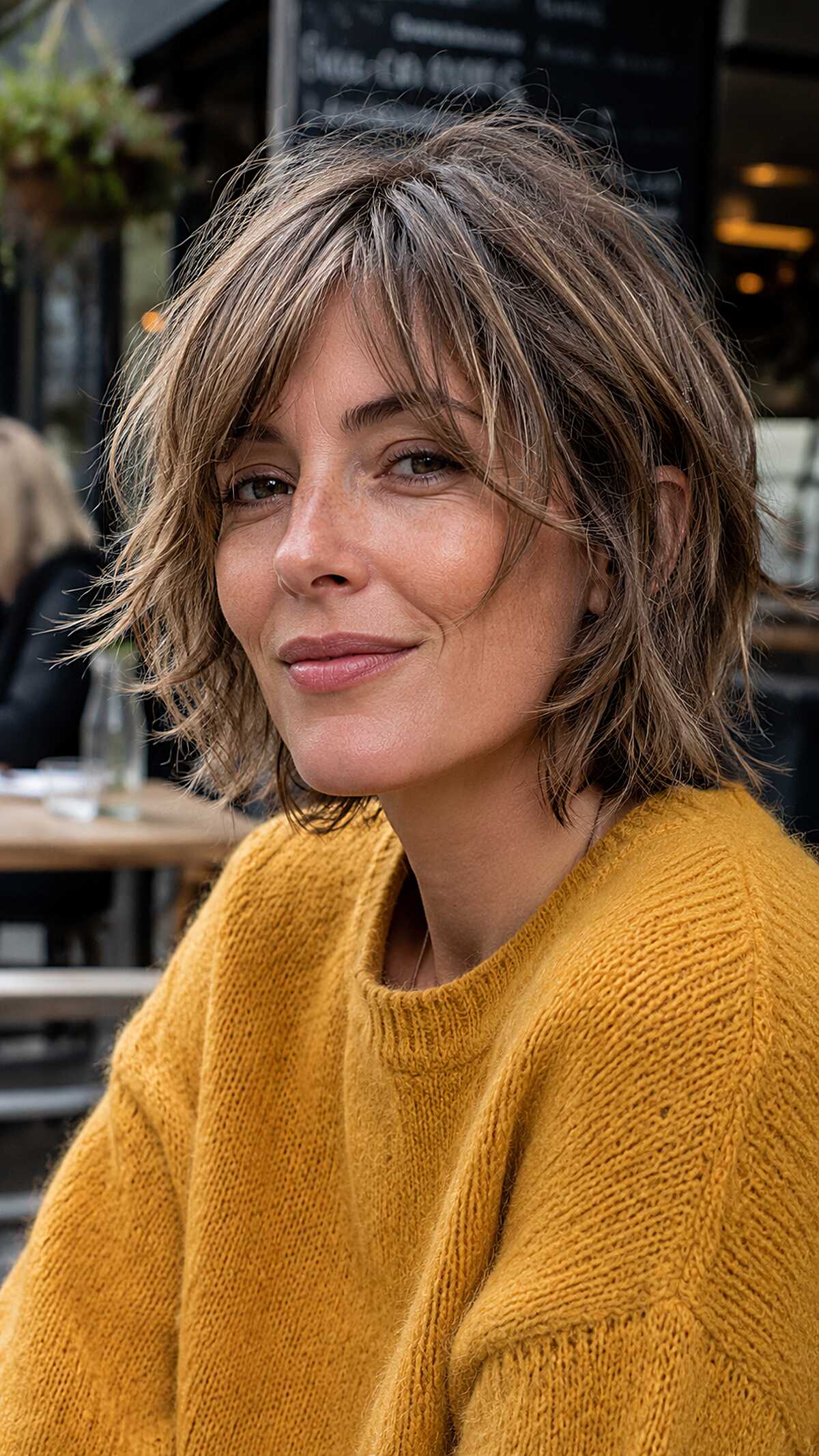 Ash bronde shaggy bob with wispy curtain layers