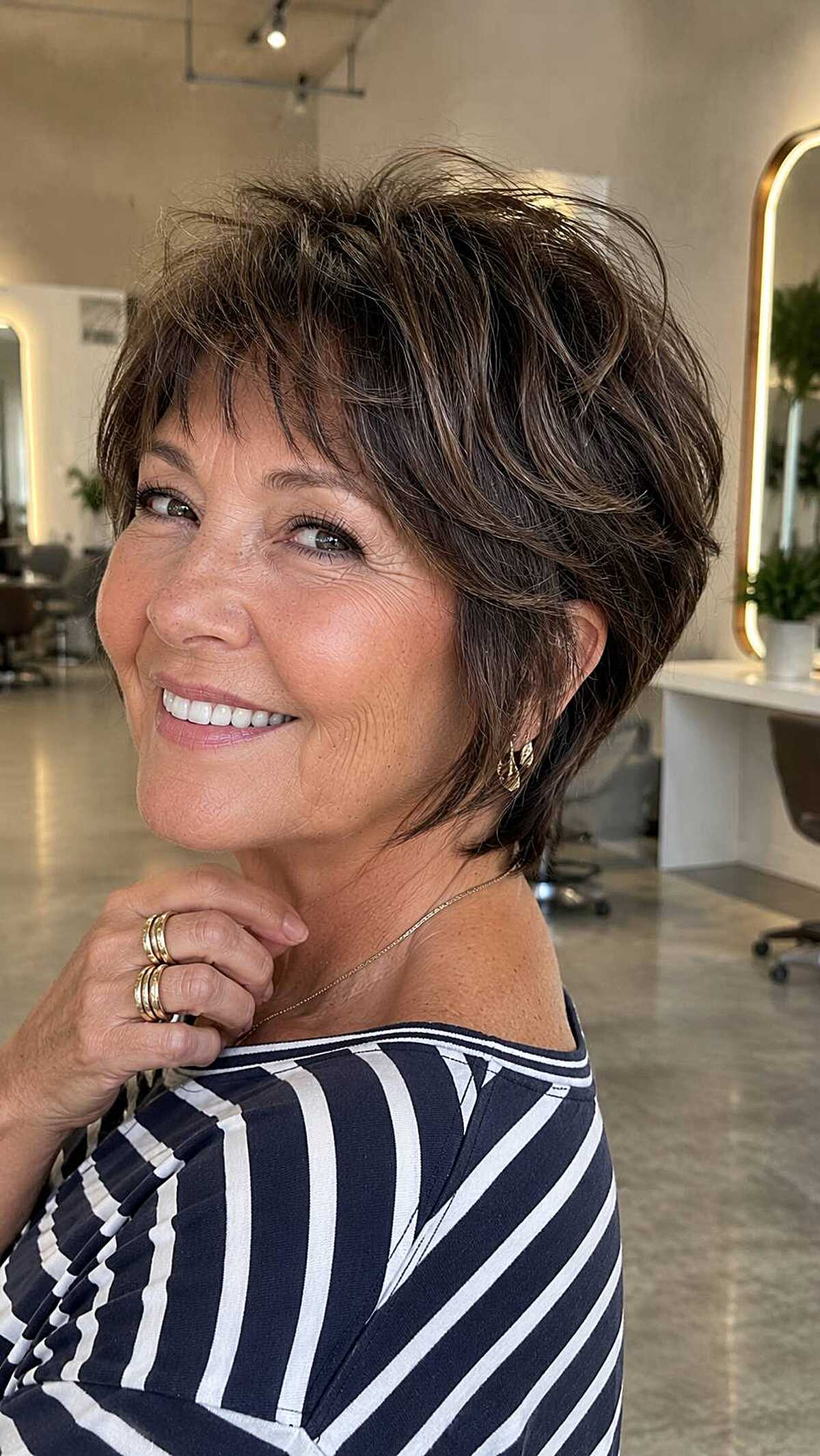 Brunette textured short cut with choppy layered bangs