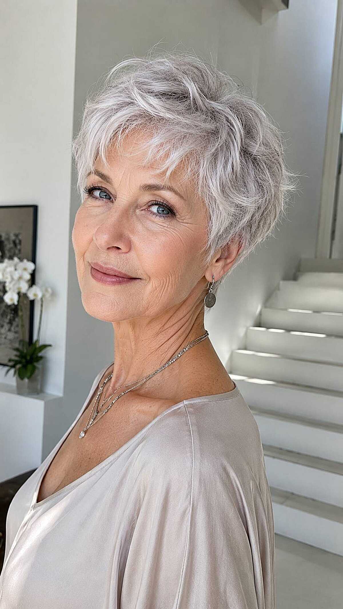 Feathered silver white pixie with soft textured bangs