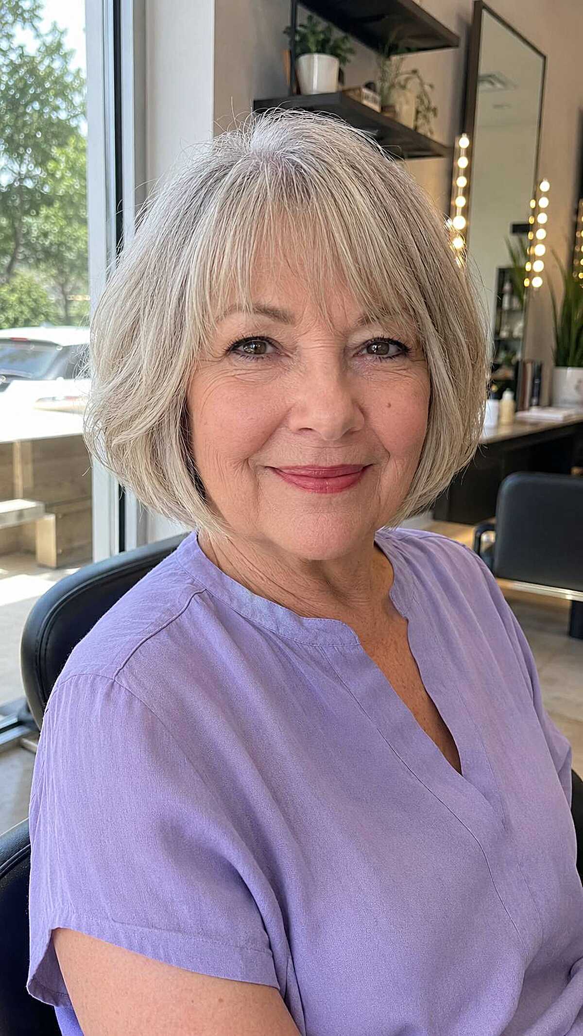 Silver chin-length bob with soft full bangs
