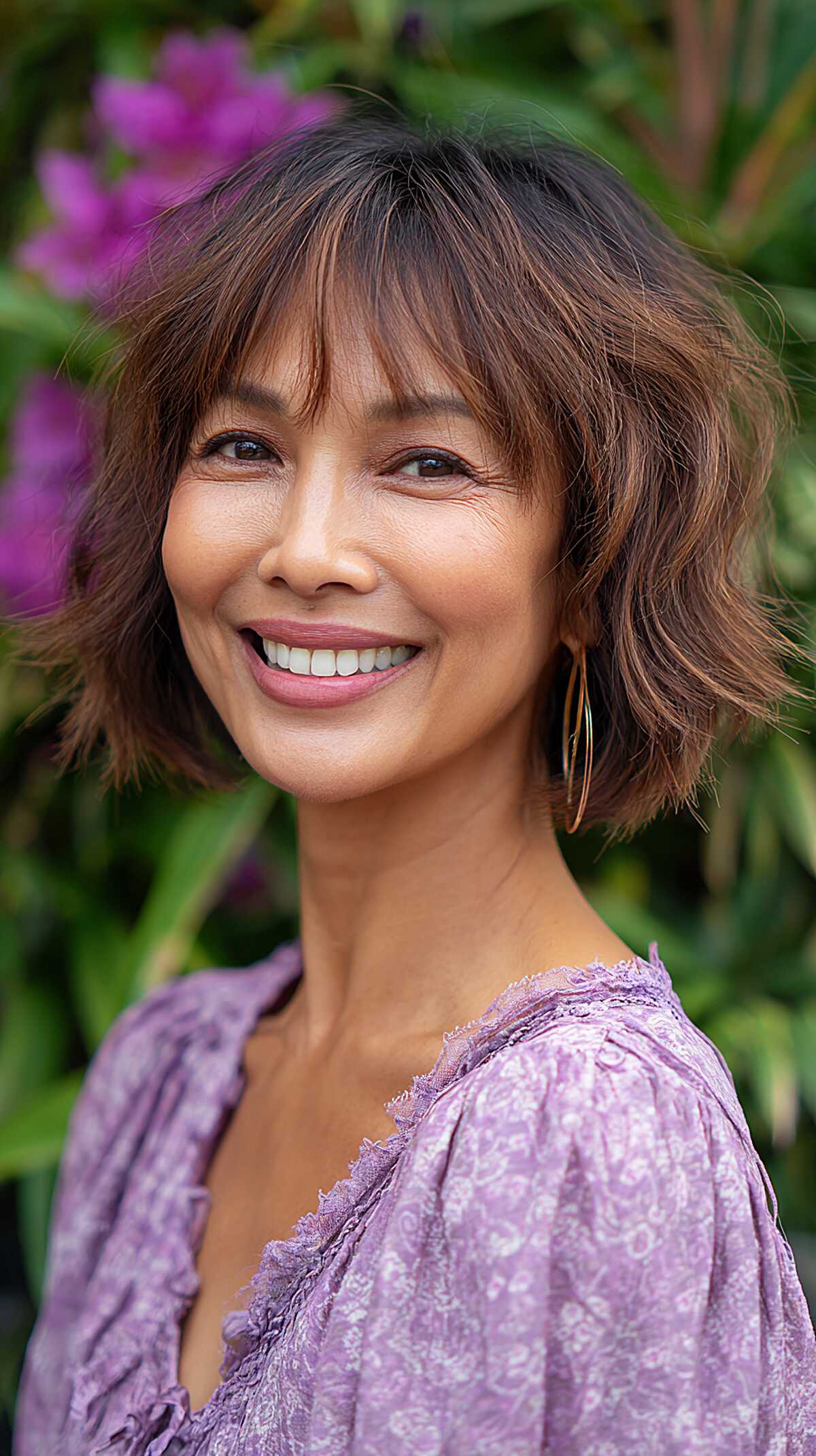 Warm brunette textured shaggy bob with airy bangs
