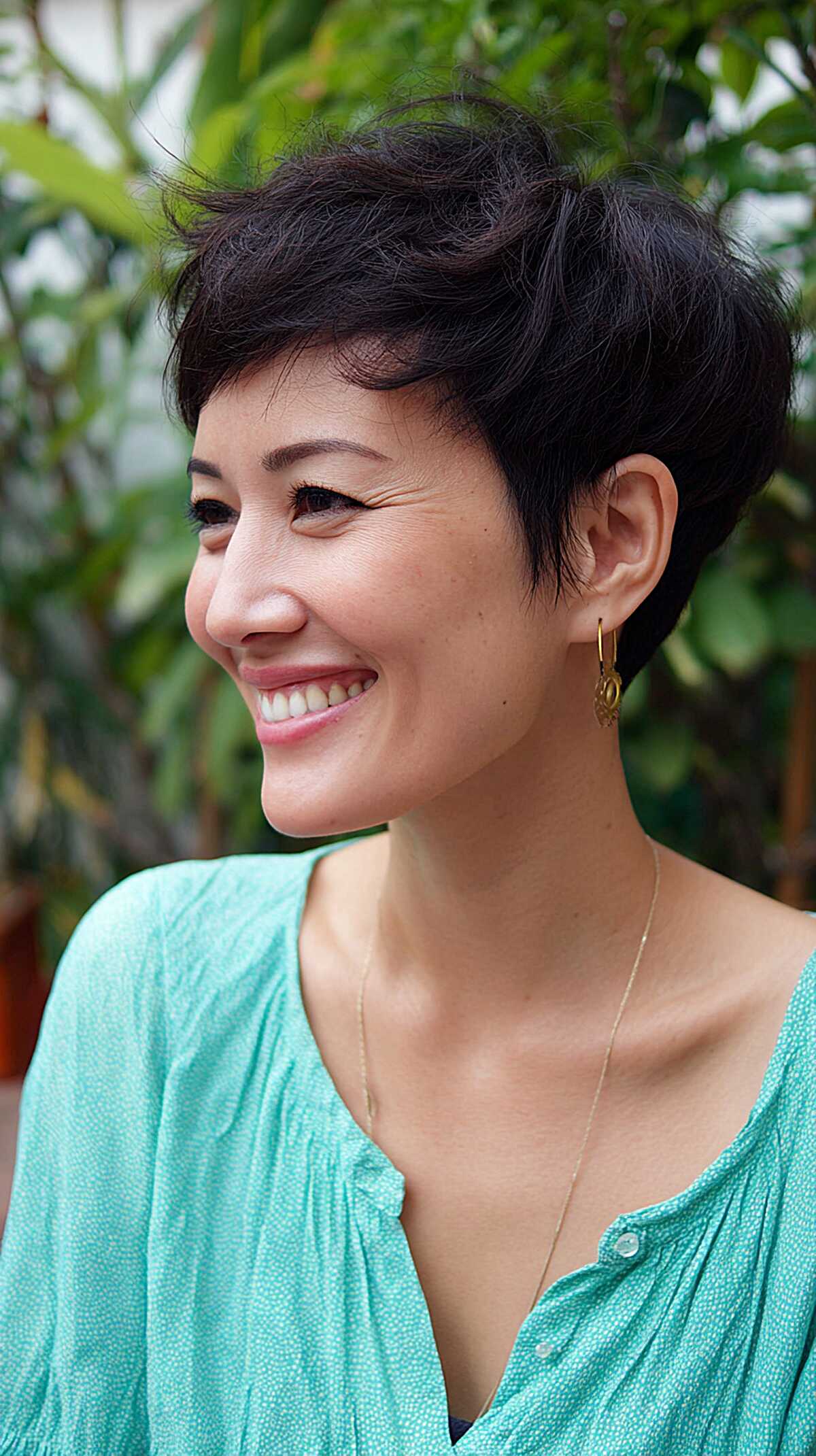 Dark pixie with feathered layers and forward-swept fringe