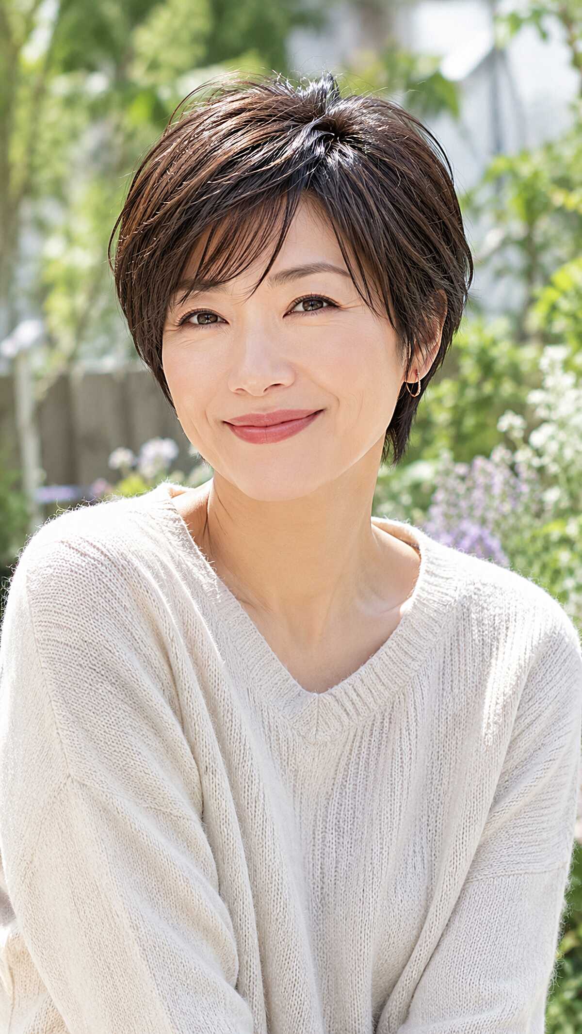 Dark brown polished pixie with smooth feathered layers