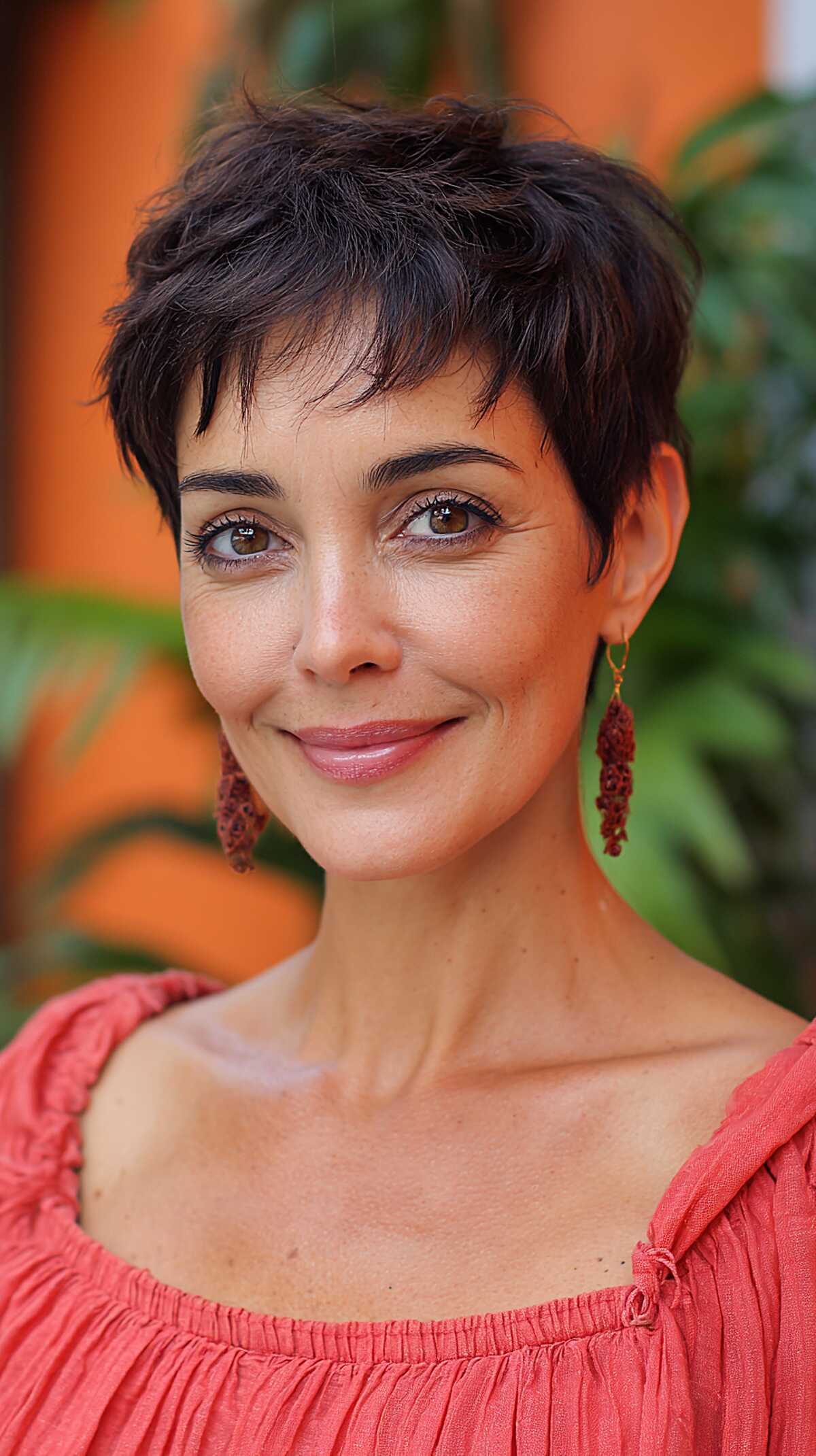 Dark brown wispy pixie with soft feathered layers