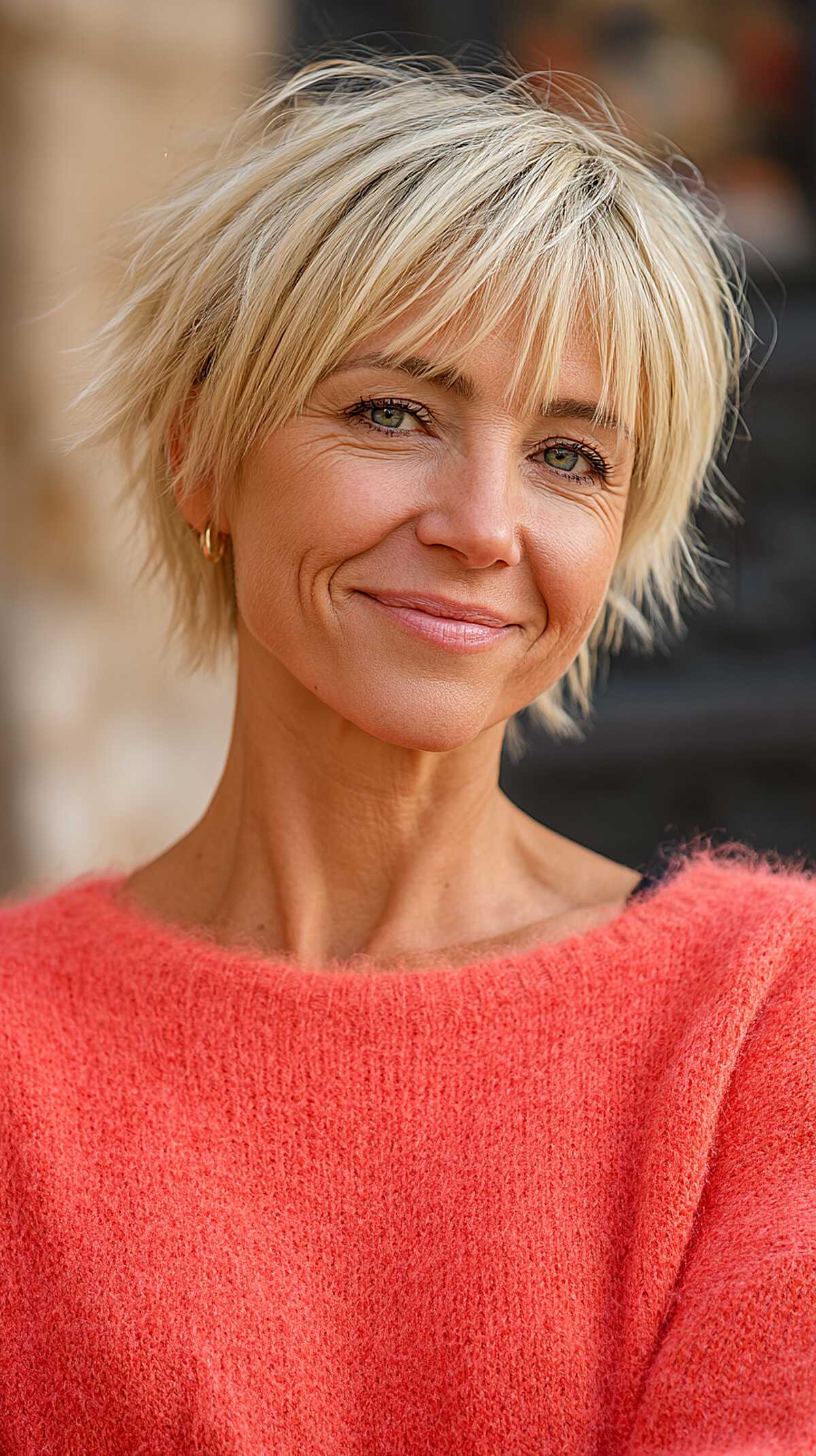 Choppy platinum blonde mixie with soft curtain fringe