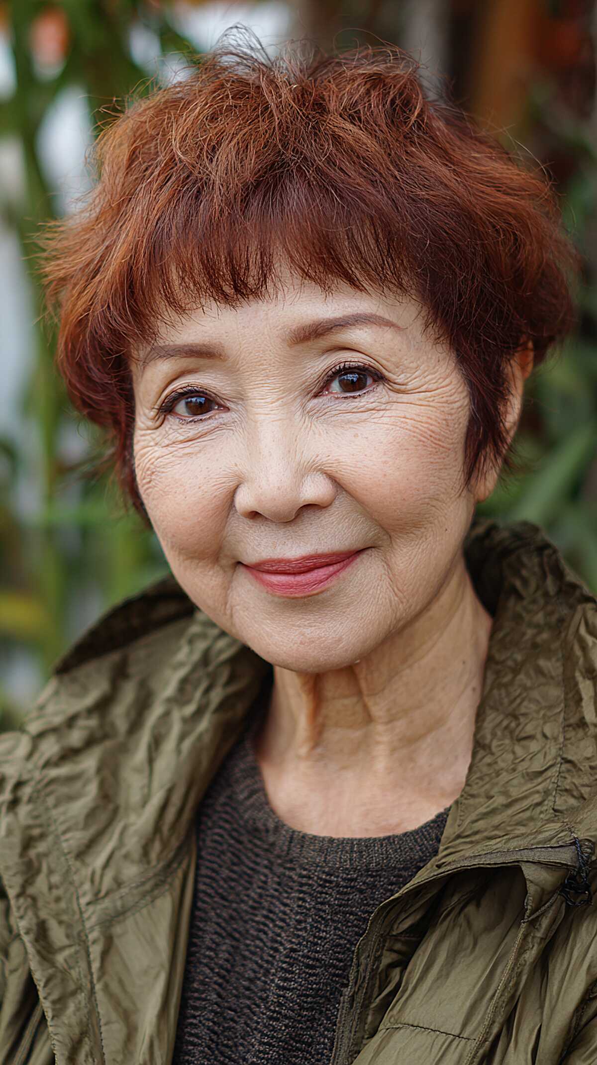 Short copper red pixie shag with choppy fringe