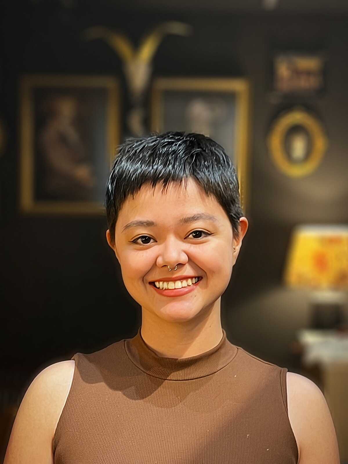 Very short textured pixie cut in black hair