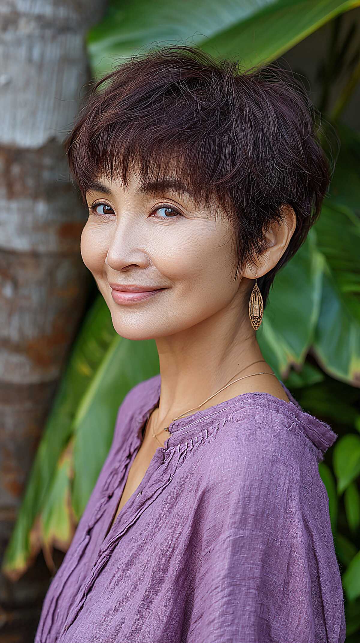 Dark plum textured pixie mixie with soft feathered top