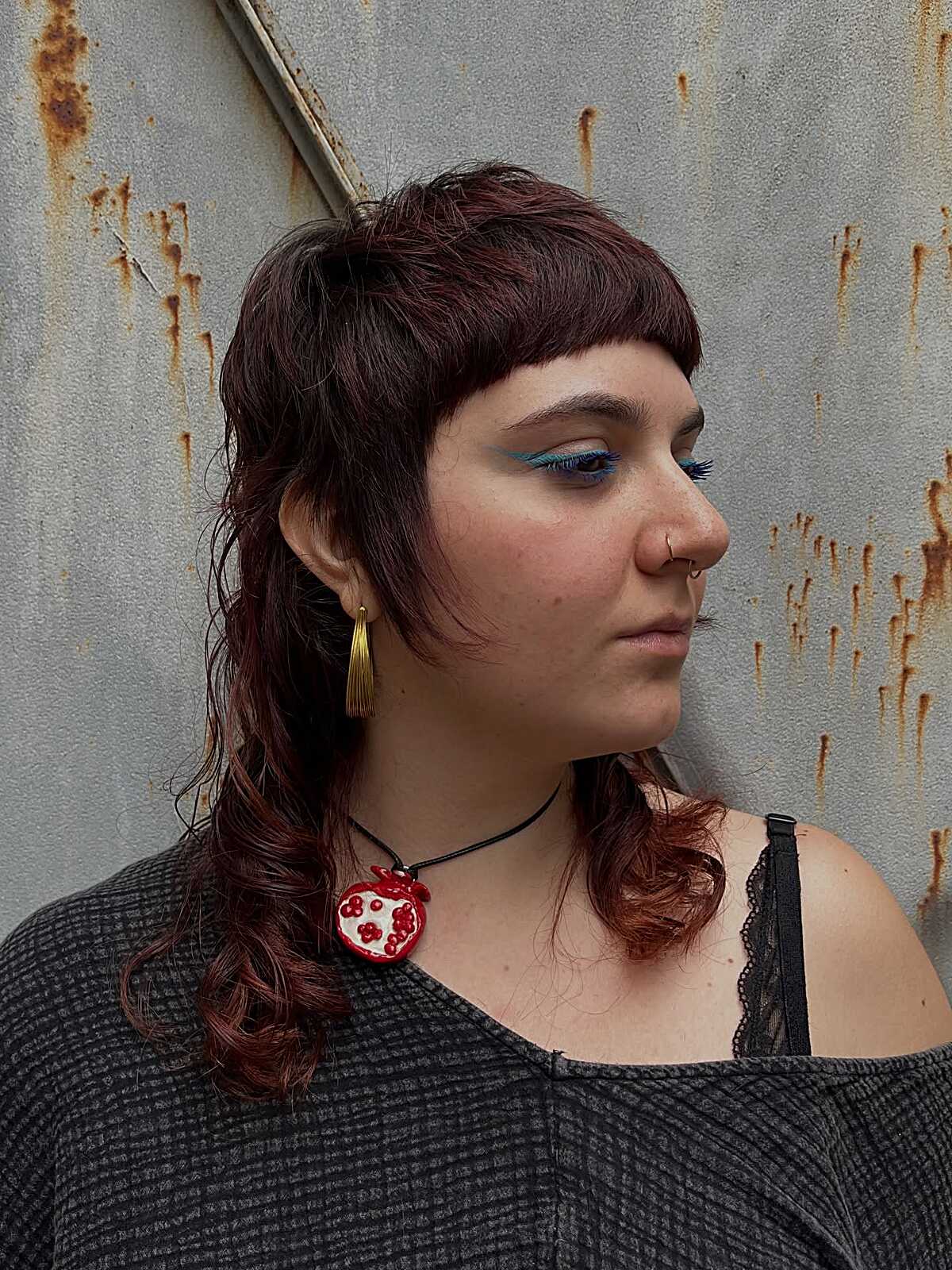 Deep burgundy mullet with curled long back section