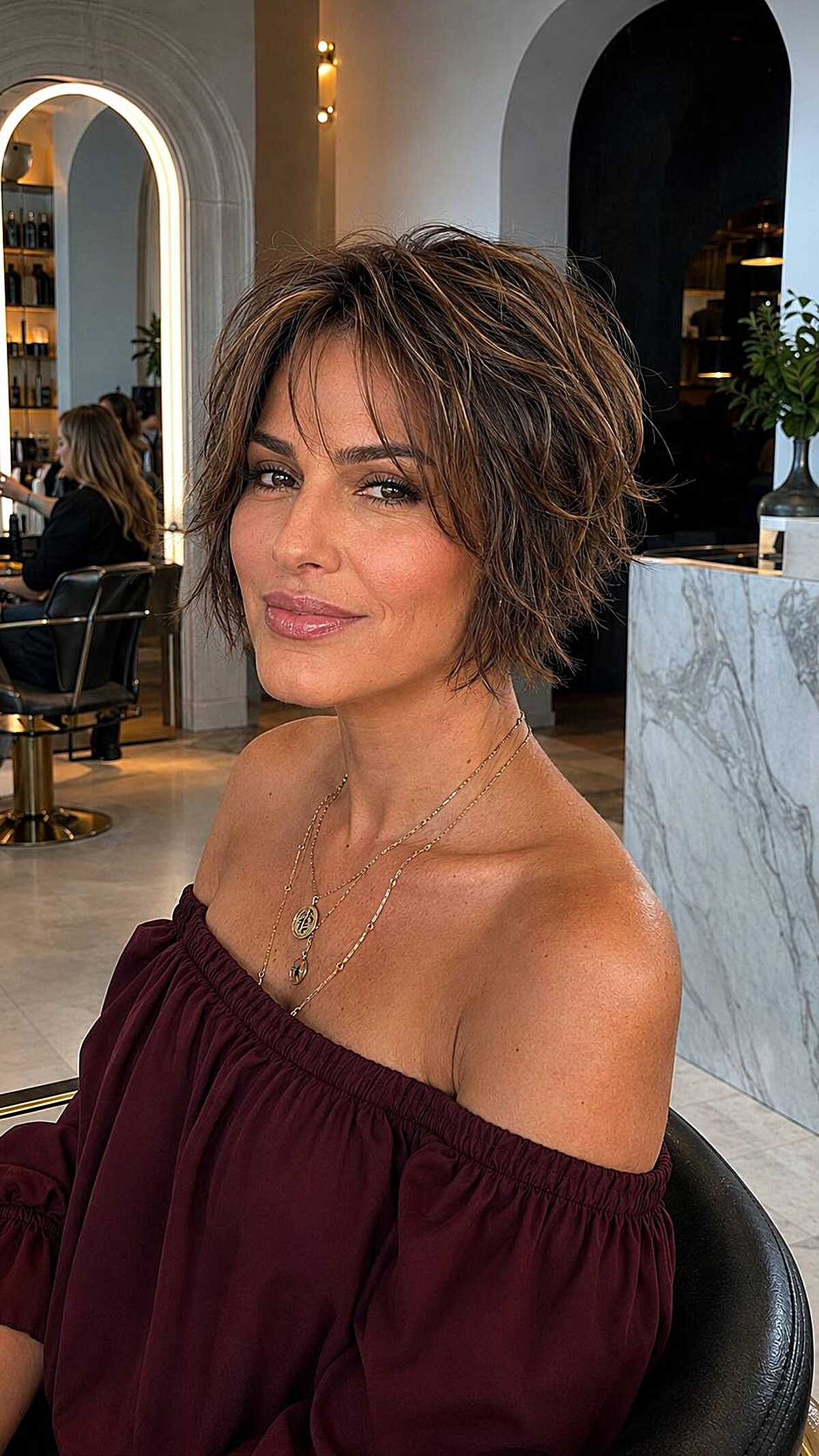 Short layered shag with honey highlights and texture