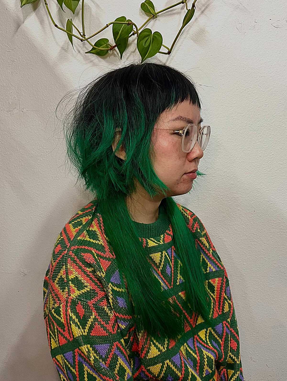Jellyfish cut with emerald green length under black bob