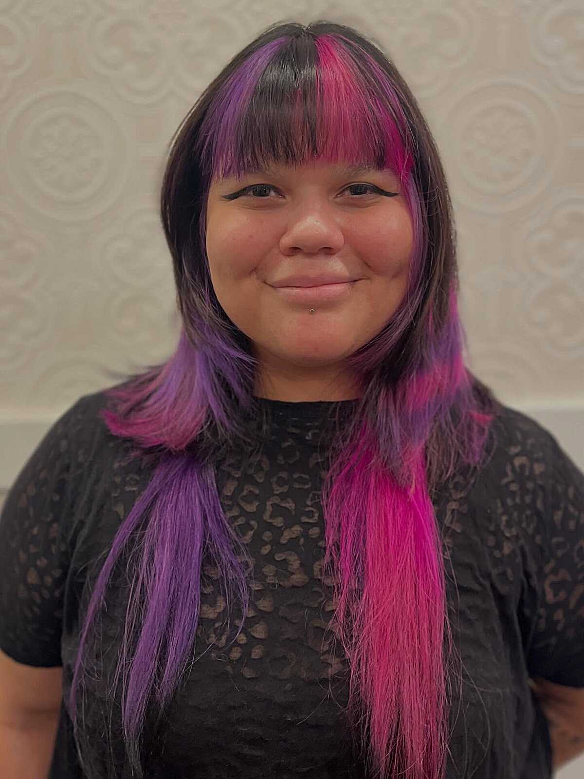 Jellyfish cut with pink and purple streaked bangs on black