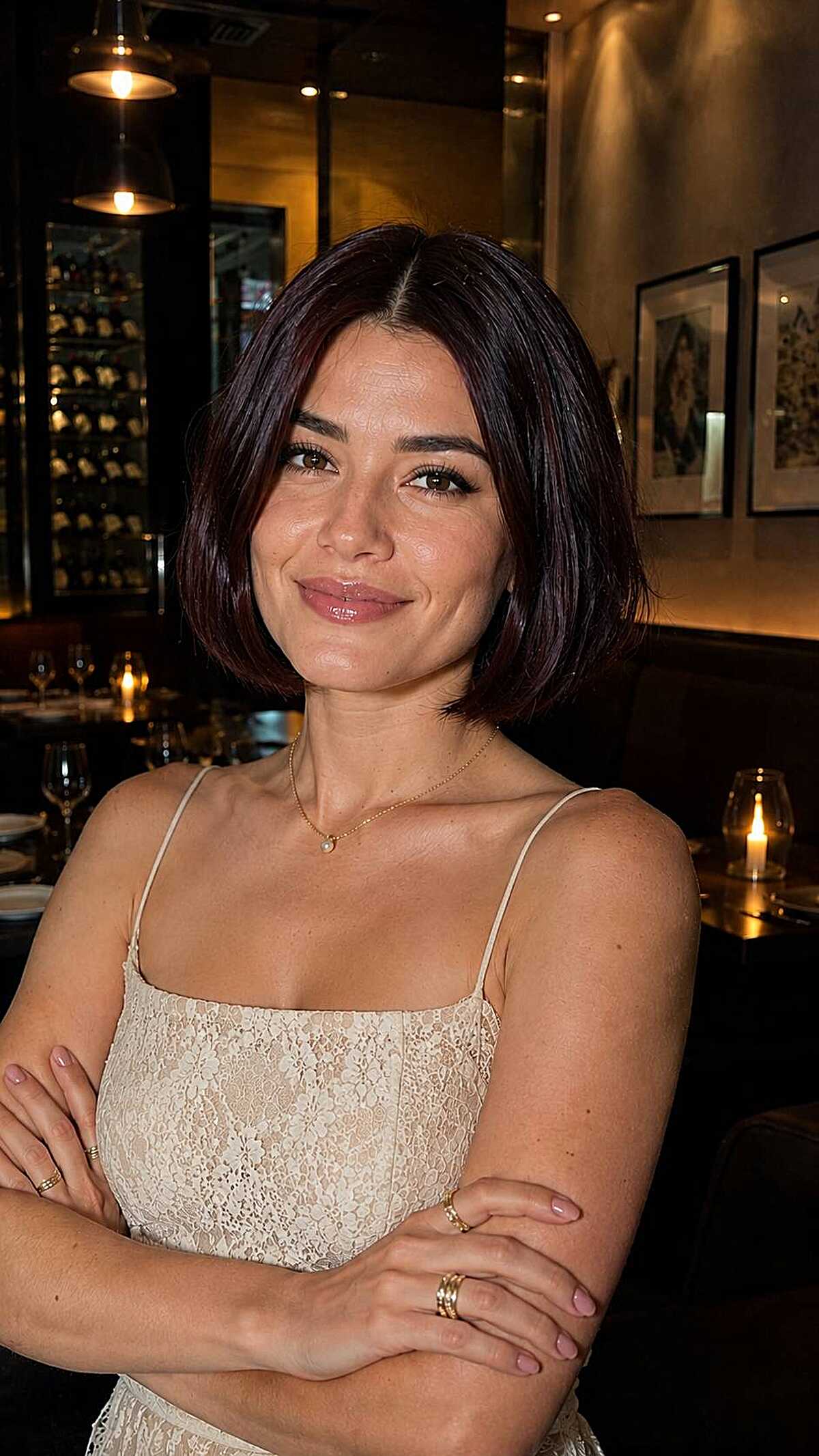 Dark plum bob with subtle sheen in restaurant lighting