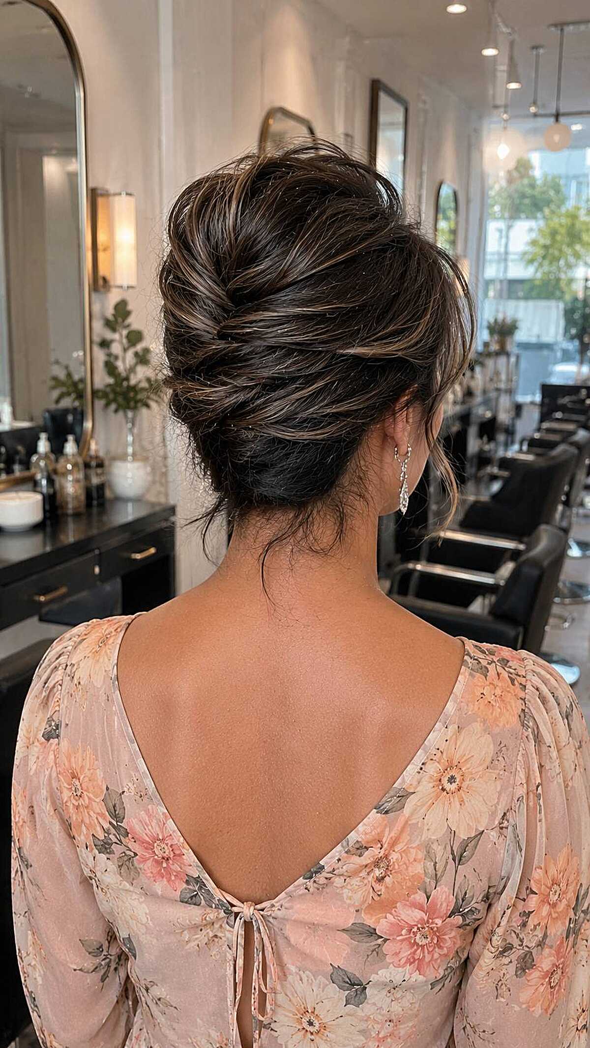 Dark hair in a romantic twisted French roll updo