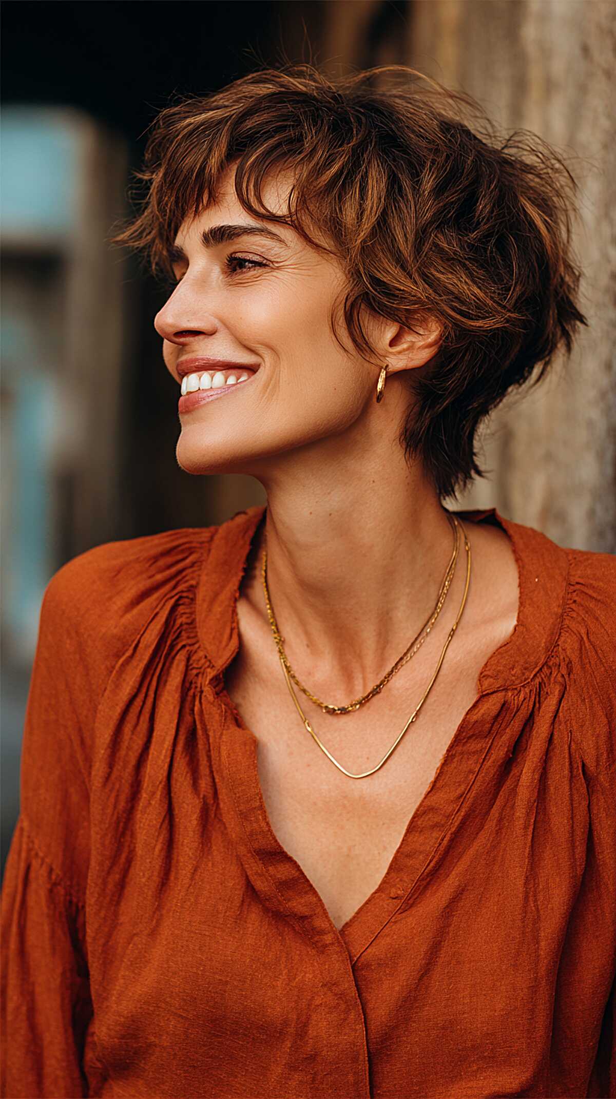 Tousled warm brunette short shag with soft waves