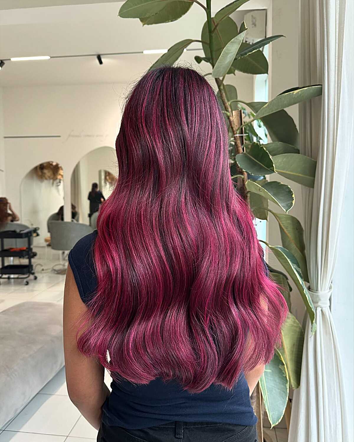 Long dark hair with rich berry rose pink color