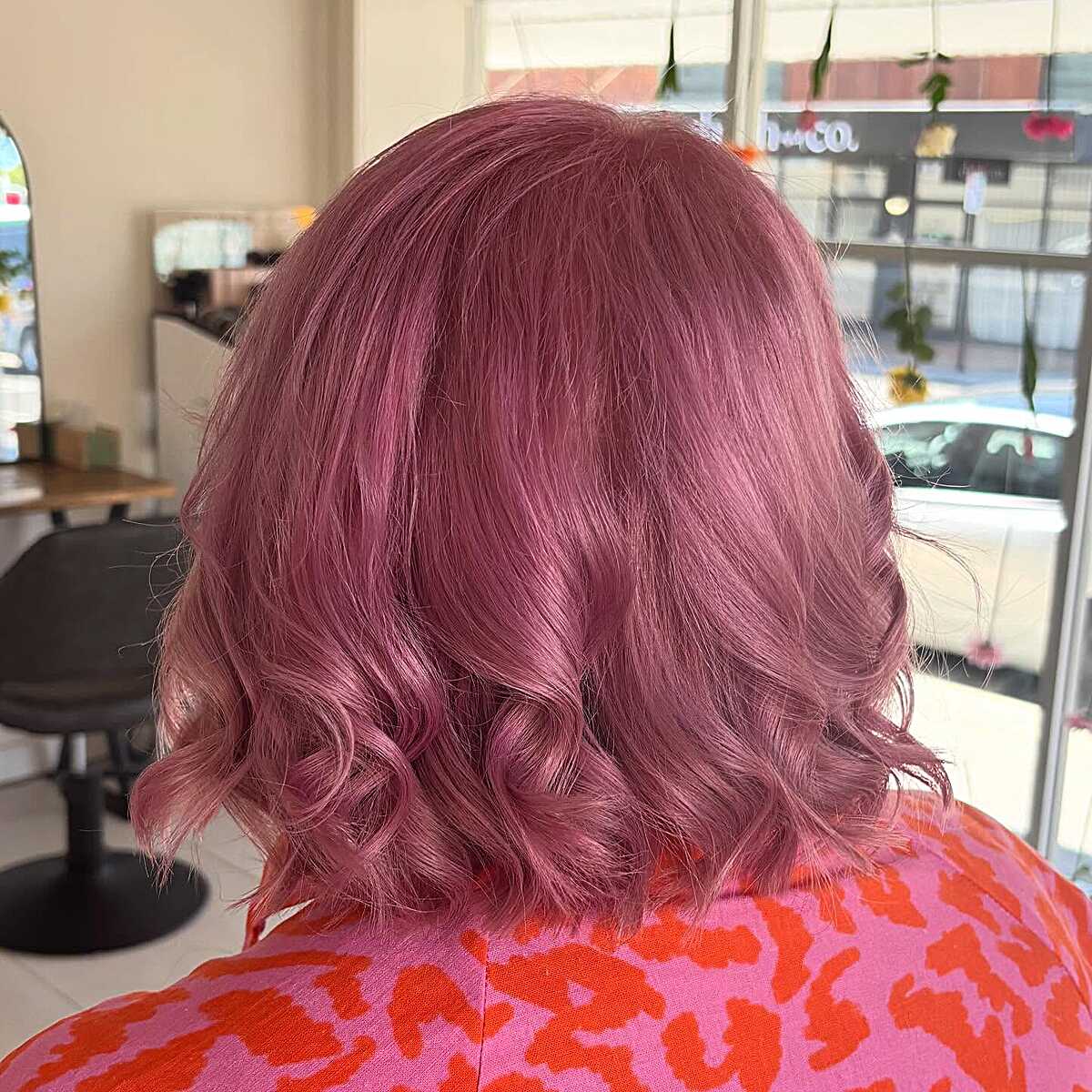 Dusty mauve pink bob with bouncy curled ends