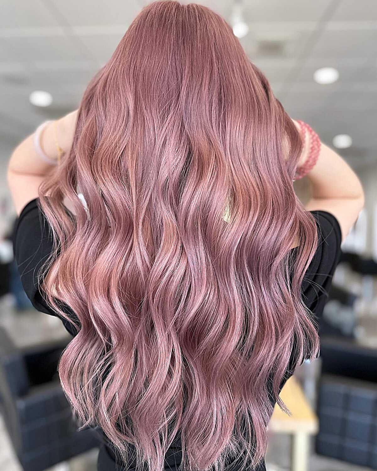 Long dusty mauve wavy hair with soft lavender undertones