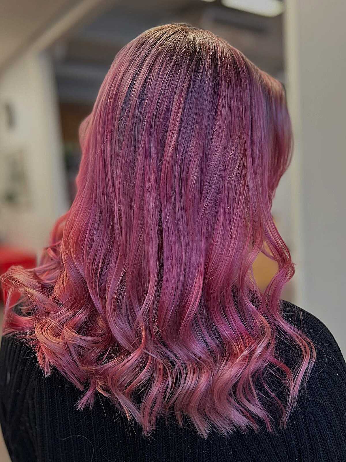 Medium-length orchid berry pink hair with curled ends