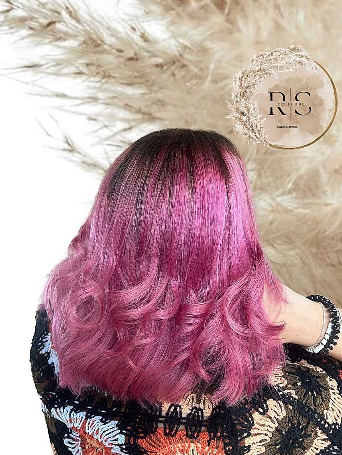 Vivid fuchsia pink bob with dark shadow root