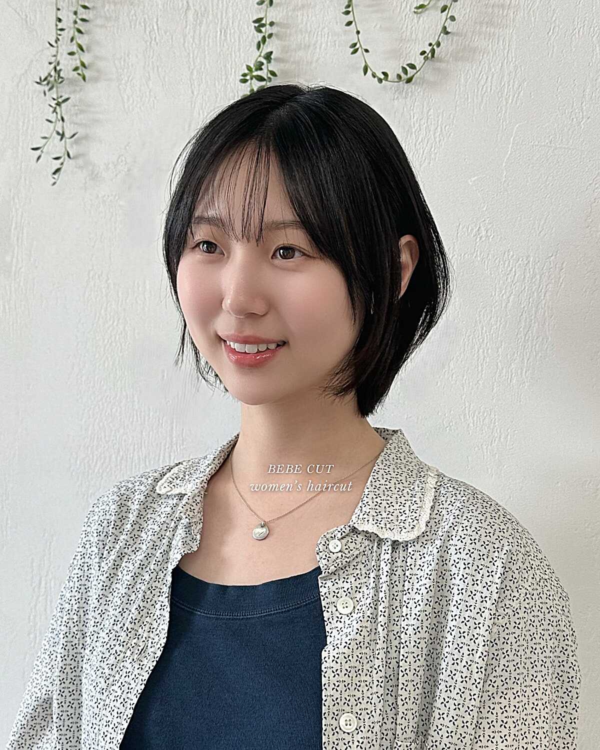 Black feathered bebe cut with airy see-through bangs