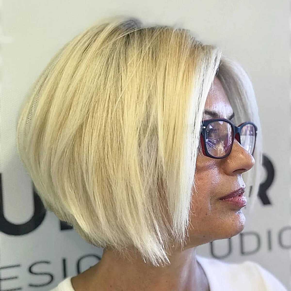 Stacked butter blonde bob with volume at the crown