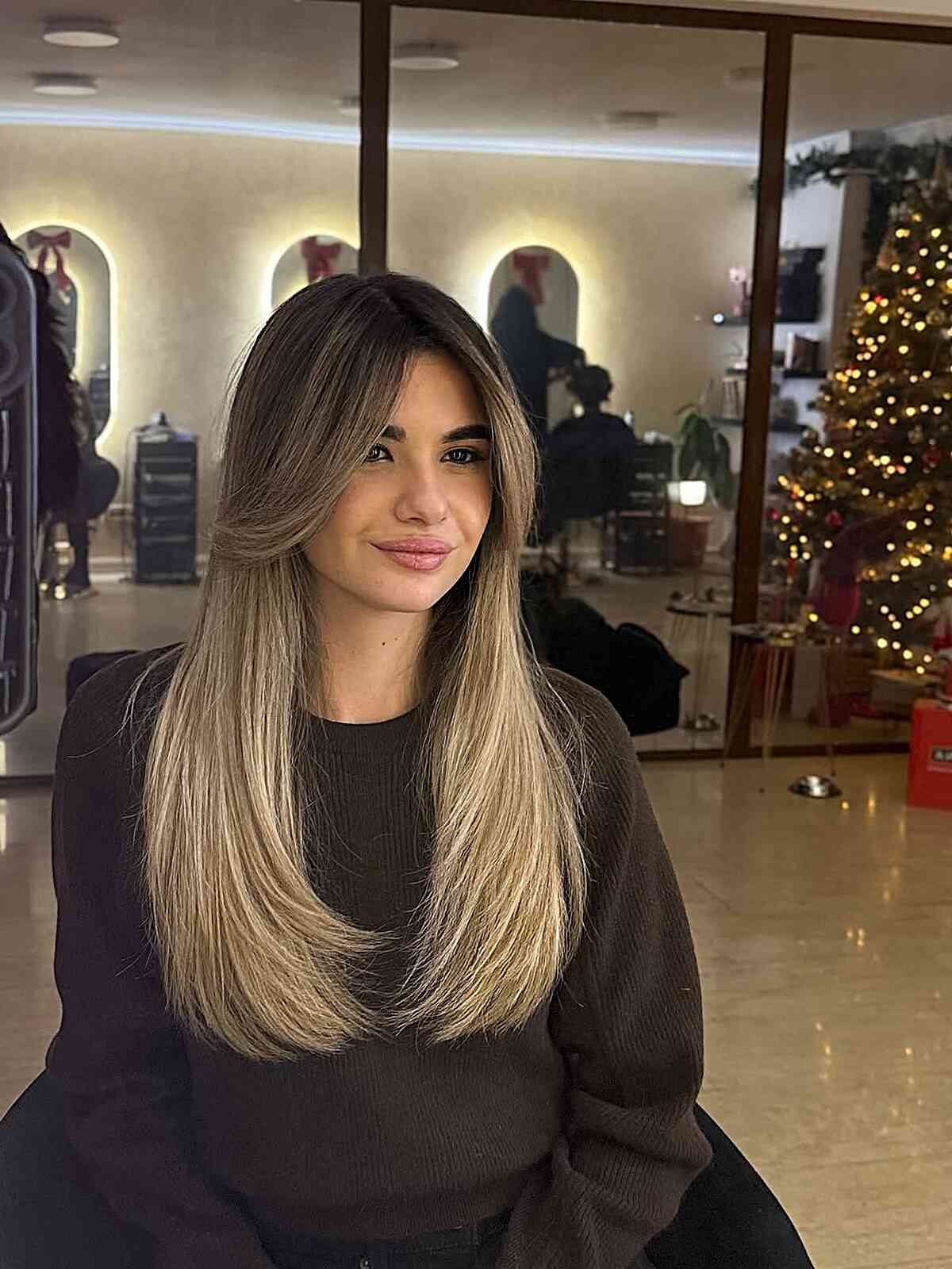 Stylish Long Layered Haircut with Balayage Highlights