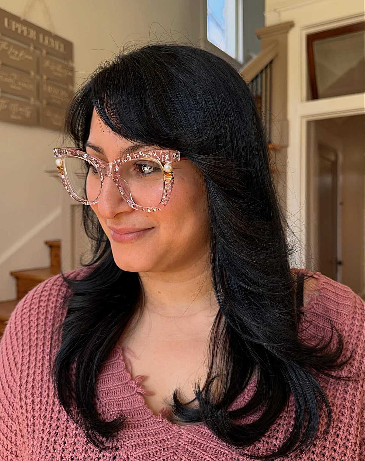 Black layered hair with bangs and glasses, retro style