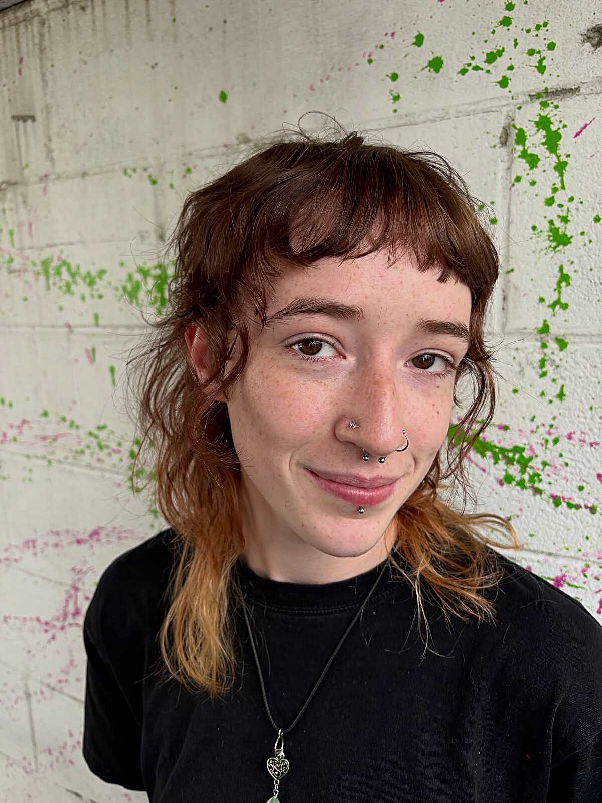 Short choppy shag with brown to rust ombre and micro bangs