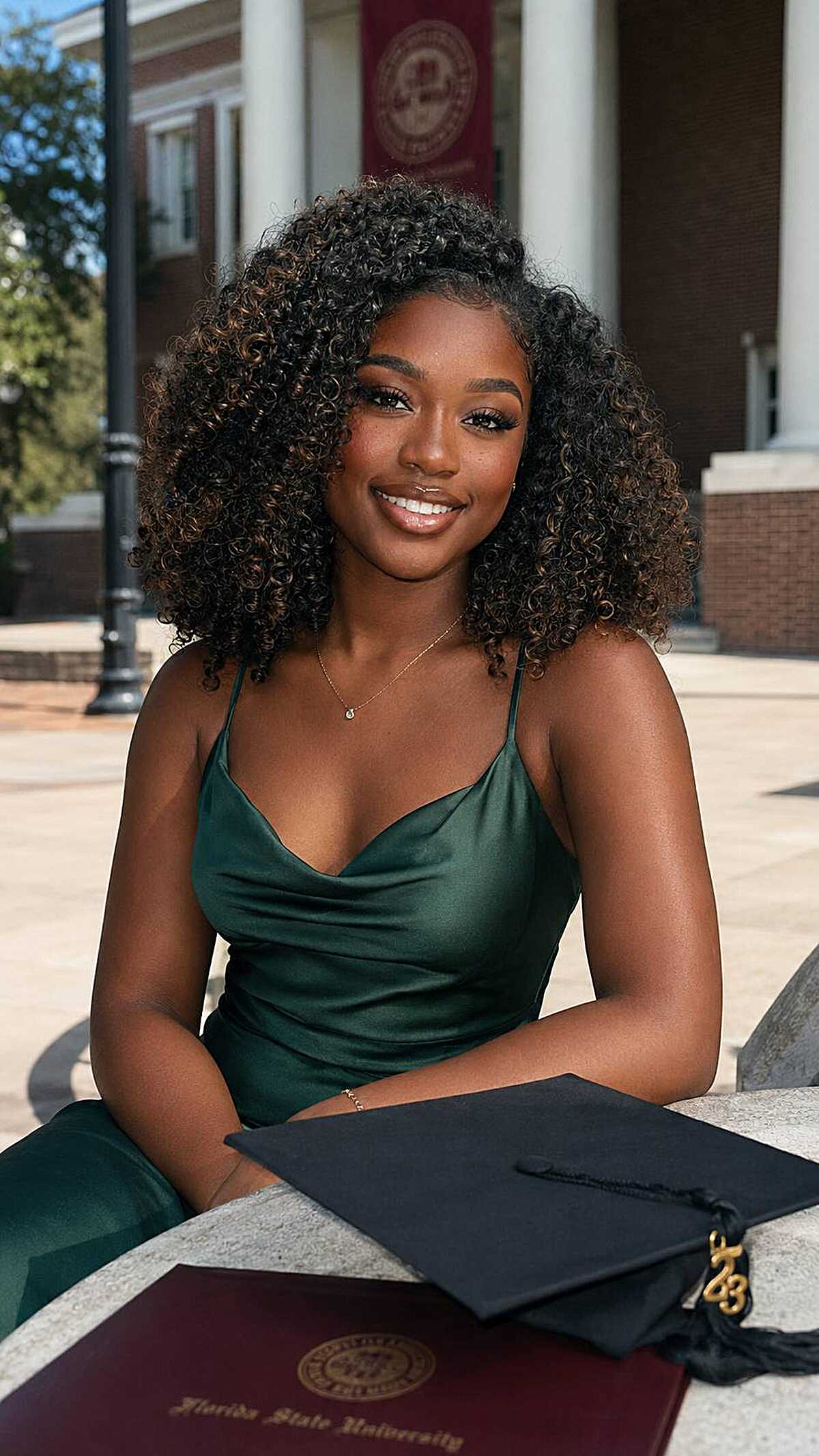 Shoulder-length curly hair with golden honey-tipped ends