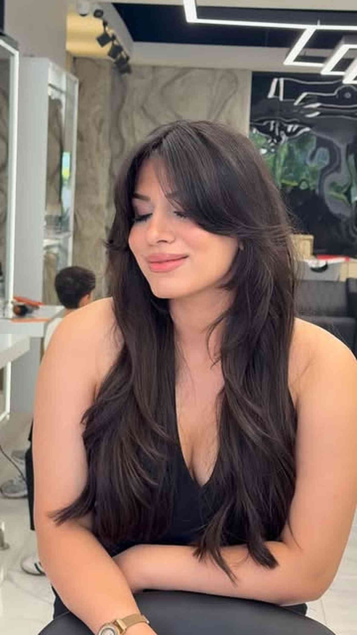 Brunette Layers with Soft Curtain Bangs