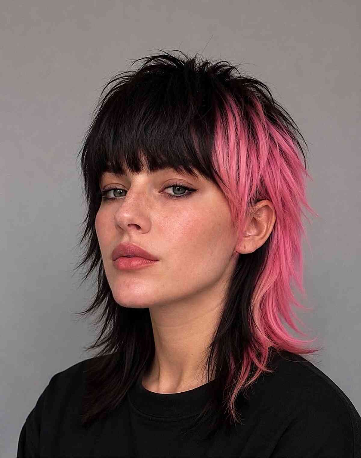 Edgy Modern Mullet with Vibrant Pink Highlights