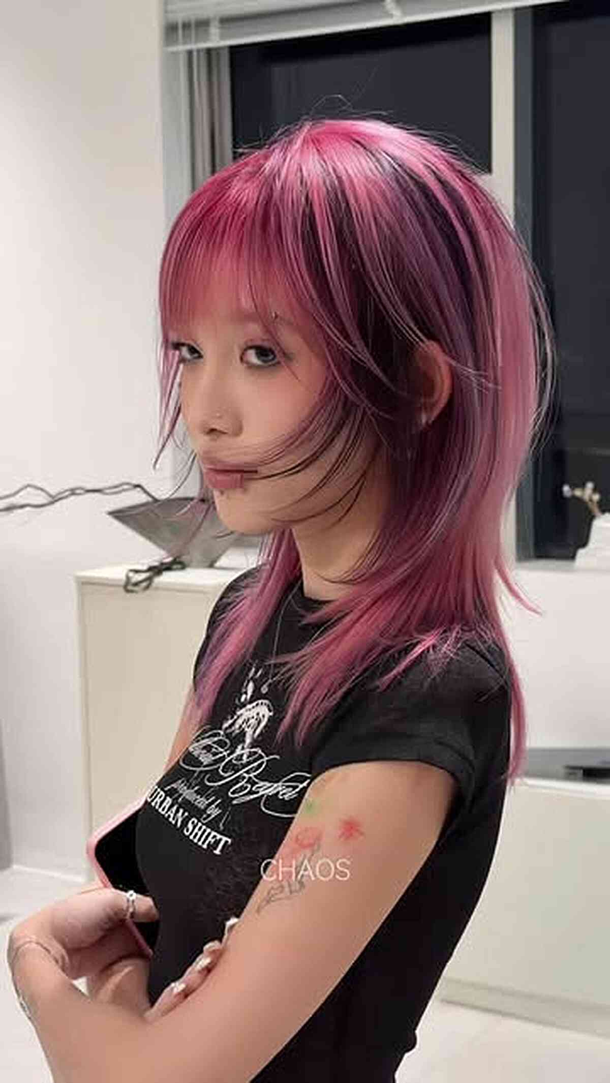 Edgy Pink Shag Wolf Cut with Face-Framing Layers