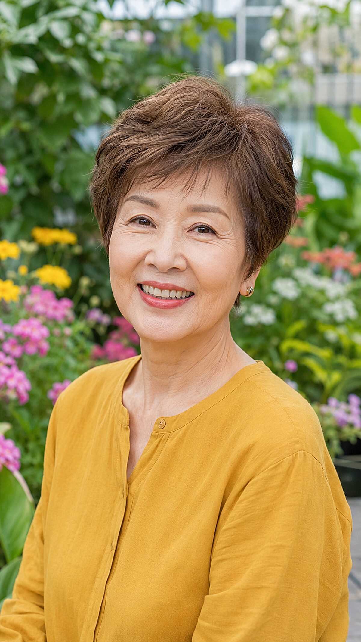 Layered brunette pixie with lifted crown volume