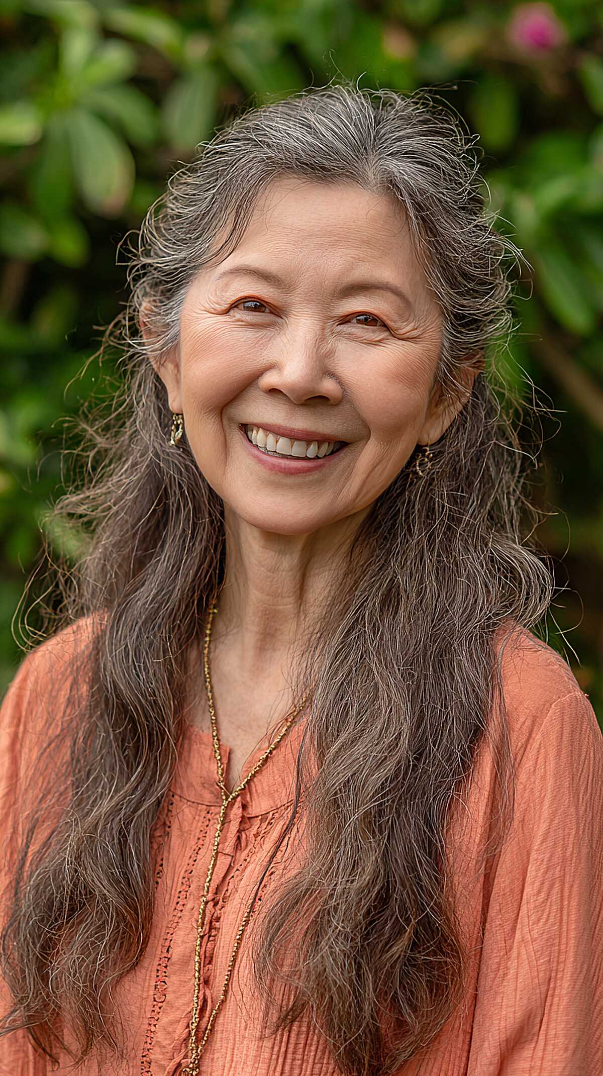 Long gray wavy hair with natural texture and volume