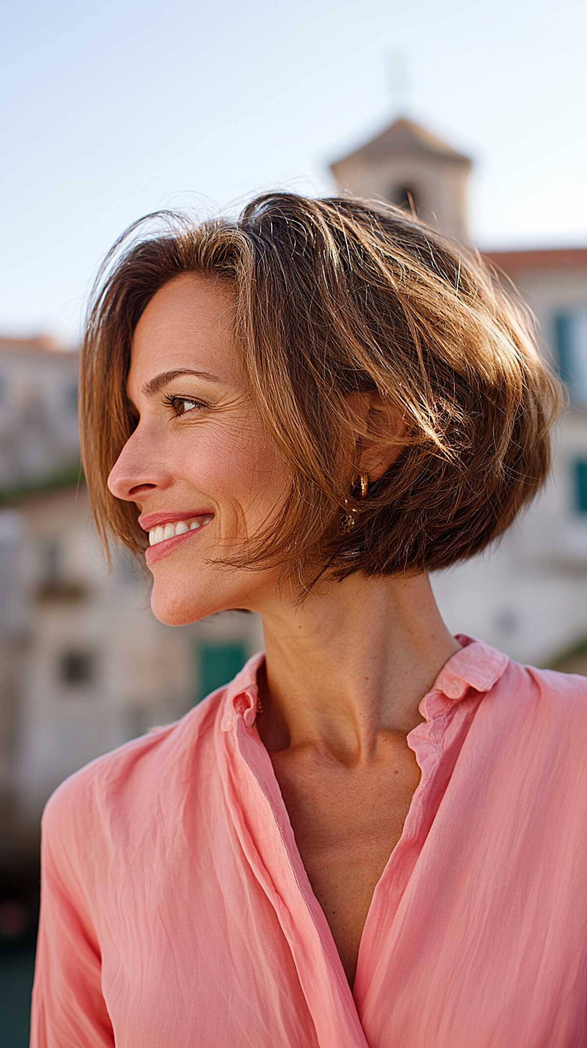Warm caramel chin-length A-line bob with soft layers