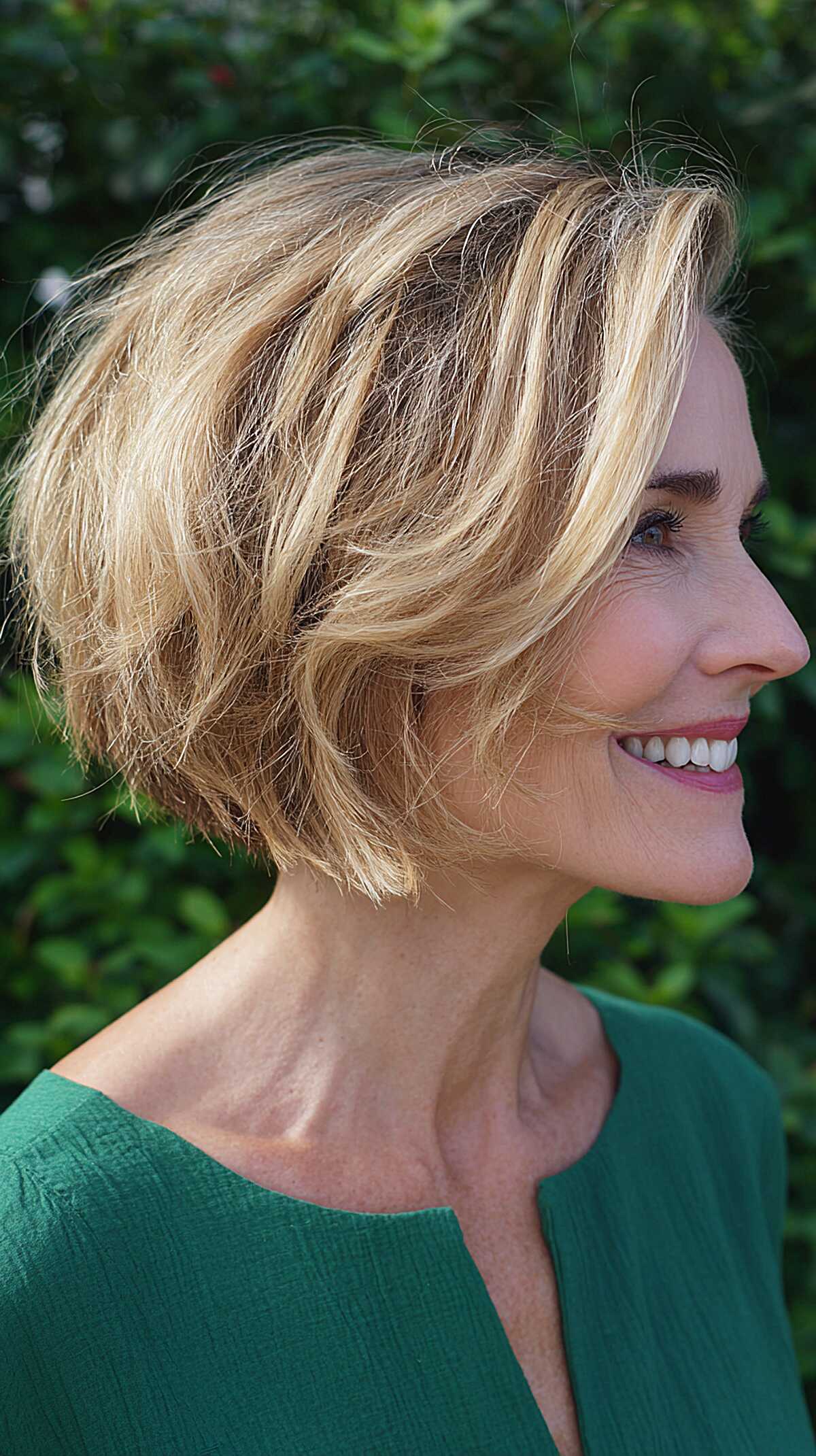 Warm honey blonde A-line bob with soft waves